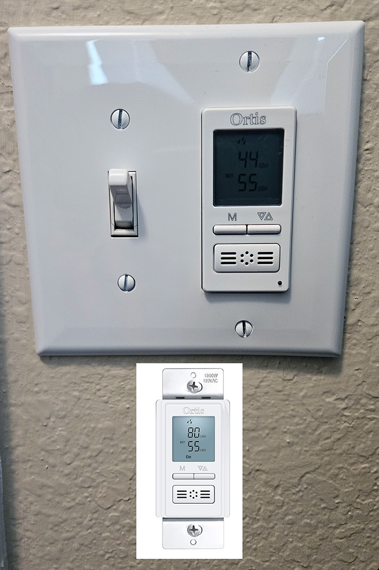 Ortis humidity-sensing bathroom fan switch installed in a laundry room to automatically control moisture levels.