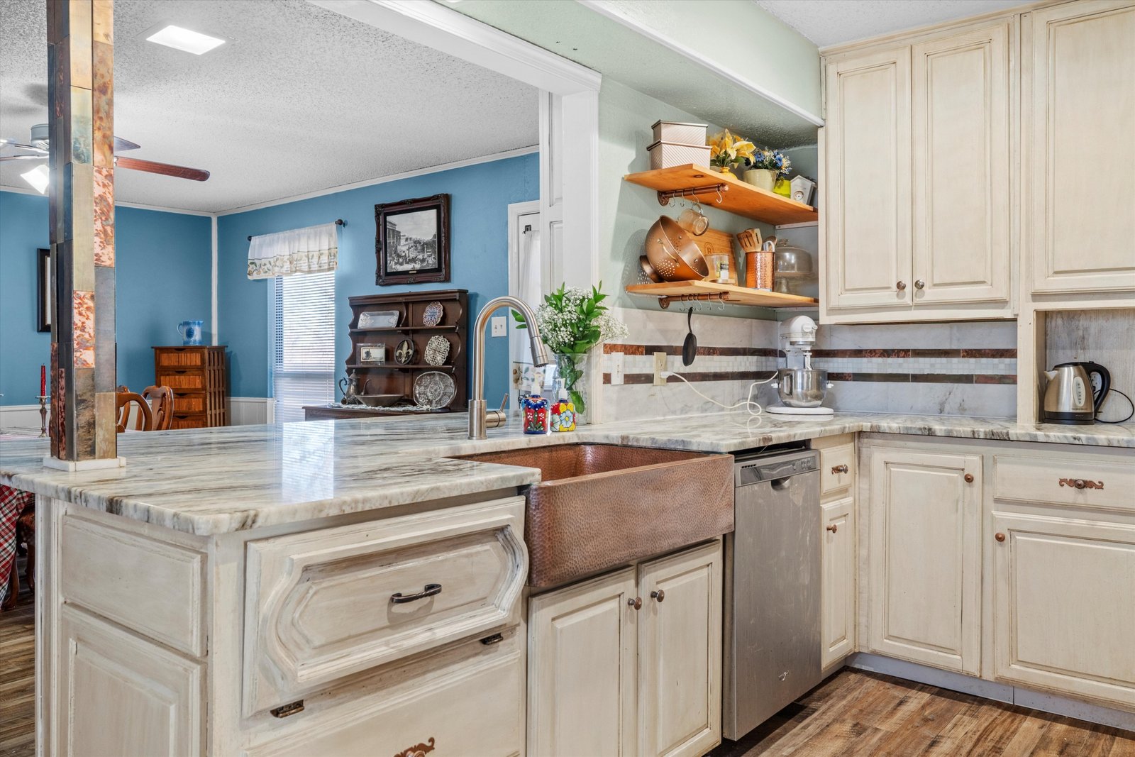 08-1613 St James Dr-08 Kitchen at 1613 Saint James Drive featuring ample cabinet storage, countertop workspace, and open sightlines to adjacent living areas.