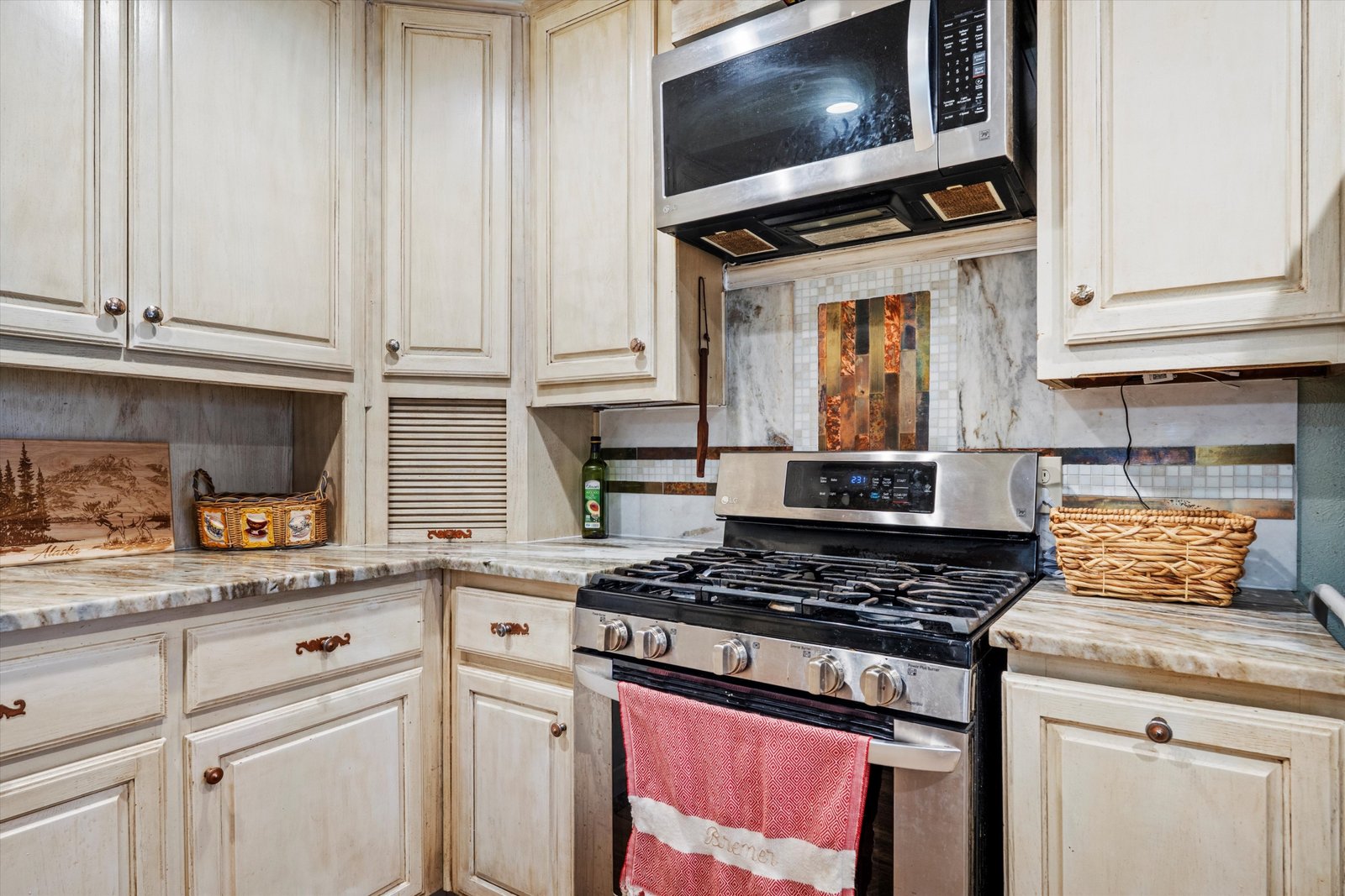 09-1613 St James Dr-09 Kitchen with gas range, generous counter space, and functional layout designed for everyday cooking at 1613 Saint James Drive.