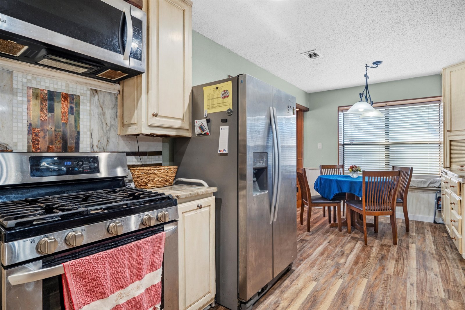 10-1613 St James Dr-10 Kitchen showcasing efficient work triangle and easy flow for casual meals and entertaining at 1613 Saint James Drive.