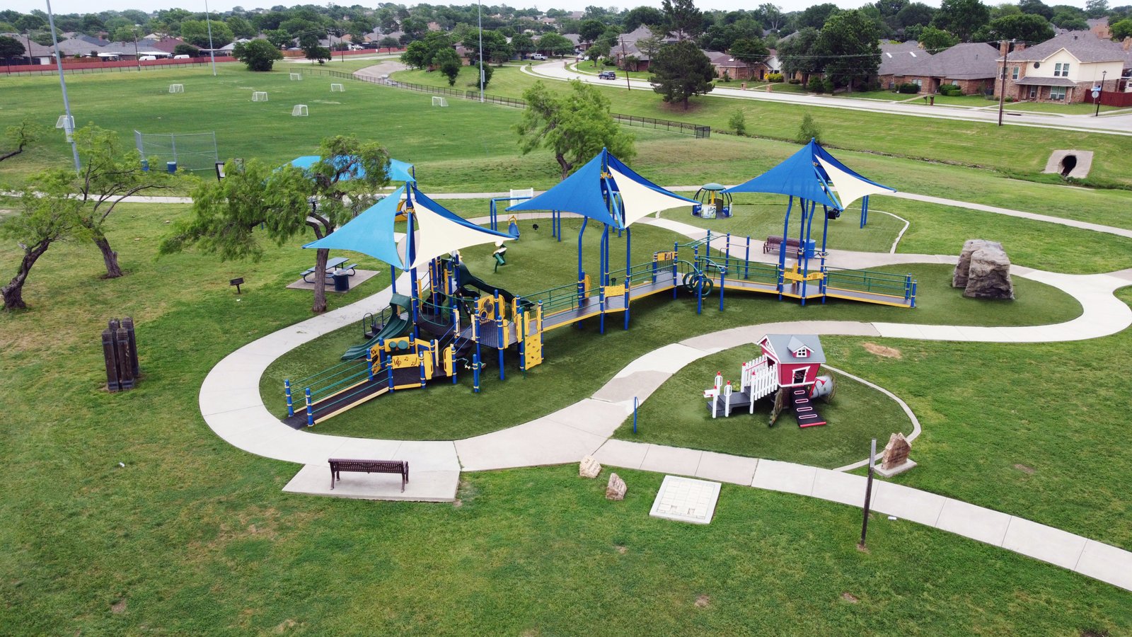 DCIM100MEDIADJI_0528.JPG Rosemeade Park featuring lighted athletic fields, inclusive playground, and shaded picnic areas near 1613 Saint James Drive.