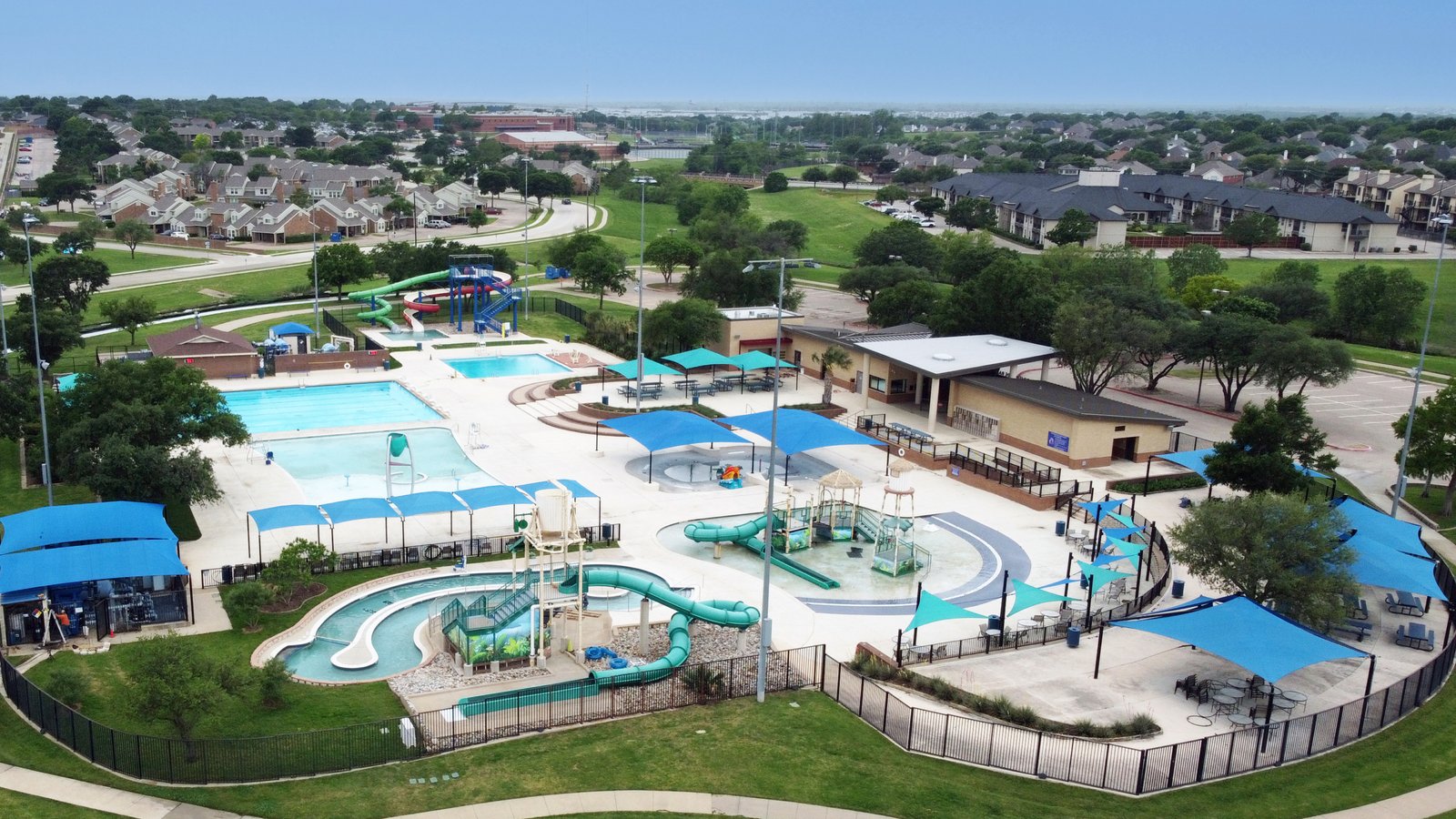 DCIM100MEDIADJI_0533.JPG Aerial view of Rosemeade Rainforest Aquatic Center located a short distance from 1613 Saint James Drive.